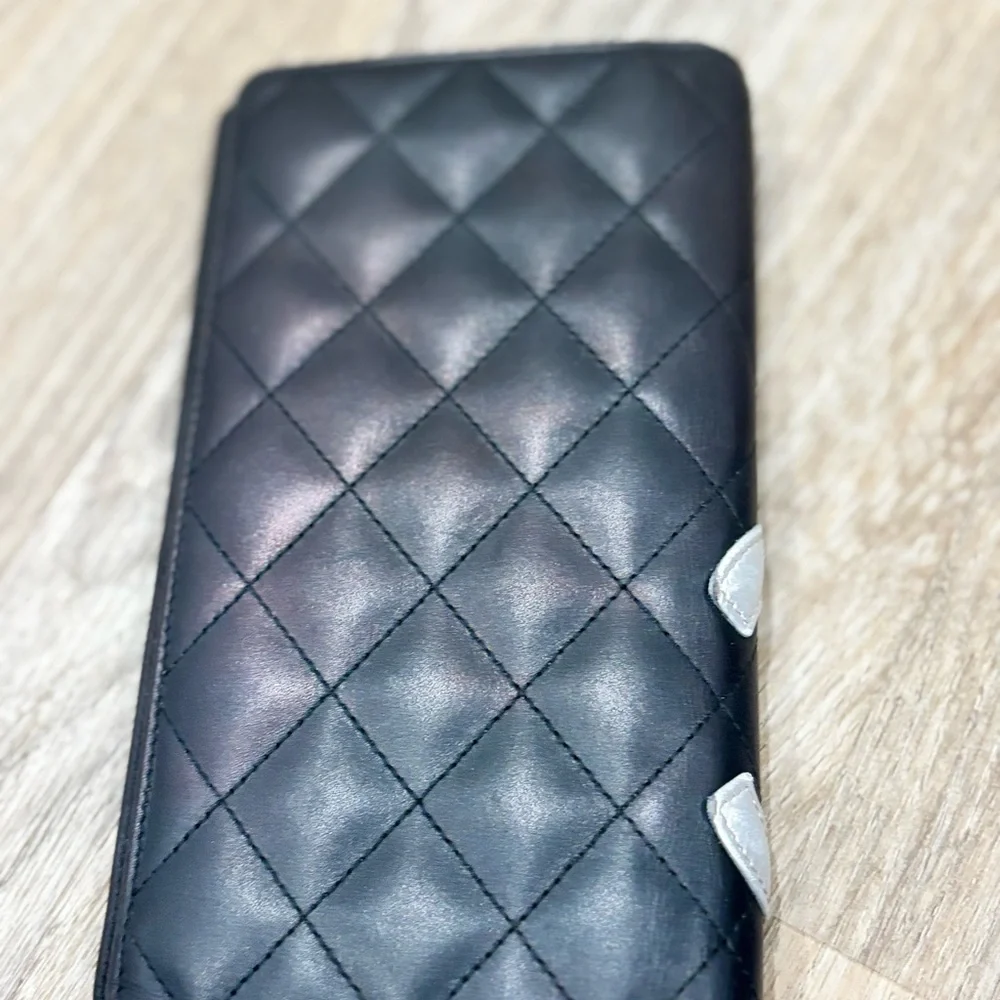 CHANEL Black and Silver Quilted Wallet